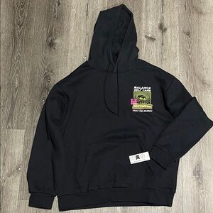 Black Graphic Hoodie with Yellow and Pink Accents